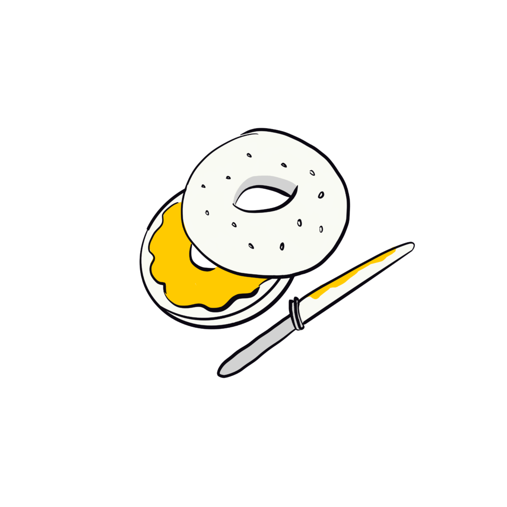 A sliced bagel with one half covered in yellow spread, next to a knife with the same spread on it, set against a plain background.